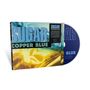 Albumcover und CD mit Aufschrift „Sugar Copper Blue“, abstrakte blau-gelbe Grafik im Hintergrund.