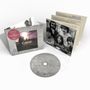 „Remastered Audio, New Liner Notes“ auf rotem Sticker. CD-Hülle mit Landschaftsbild, graue CD mit Titelliste.