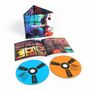 Text: "feeder," "polythene." Zwei CDs, eine blau, eine orange, mit Booklet und Verpackung in buntem, künstlerischem Design.