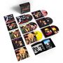 Der Text zeigt "Hanoi Rocks" auf mehreren CD-Hüllen. Darauf sind Fotos einer Band mit auffälligen Frisuren.