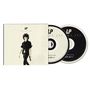 Texte "LP" und "Lost on You". Eine Person in dunkler Kleidung geht, zwei CDs sichtbar.