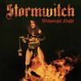 Text: "Stormwitch", "Walpurgis Night". Eine Frau in Leder mit einer Keule steht in Flammen.