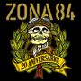 "ZONA 84" oben, darunter "20 ANIVERSARIO!" auf gelbem Banner vor einem Schädel mit Fliegerkappe.