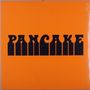 Der Text "PANCAKE" steht in dicken, schwarzen Buchstaben auf orangefarbenem Hintergrund.