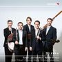 „GENUIN“, „ZELENKA“, „Ángel Luis Sánchez | Ramón Ortega | Marc Trénel | Wies de Boevé | Alfonso Sebastián“. Fünf Männer in Anzügen mit Instrumenten.