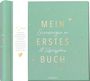 "Mein erstes Buch: Erinnerungen an 18 Lebensjahre." Ein grünes Album mit goldenen Herzmotiven und eleganter Schrift.