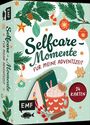 "Selfcare-Momente für meine Adventszeit" steht zentral. Illustration mit Weihnachtsdeko, Tasse Kakao, Buch, 24 Karten.