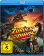"Zurück zu den Dinos", FSK ab 6 freigegeben. Ein großer Dinosaurier, über ihm ein UFO, zwei Kinder stehen vorne.