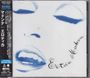 Auf weißem Hintergrund steht in Blau "Erotica Madonna" neben einem stilisierten Gesicht mit geschlossenen Augen und geöffneten Lippen.