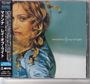 Text: "MADONNA ray of light". Links vertikaler japanischer Text. Frauenporträt, blondes Haar, blaue Kleidung.
