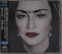 Cover mit dem Text "MADONNA" und "MADAME X". Portrait einer Frau mit roten Lippen und blauen Augen. Japanischer Text links.