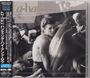 CD-Cover mit Text: "a-ha hunting high and low". Drei Männer in Schwarz-Weiß, der vordere trägt ein ärmelloses Hemd.