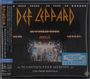 "DEF LEPPARD" in großer Schrift darüber, "DIAMOND STAR HEROES" und "LIVE FROM SHEFFIELD", darunter eine Bühnenaufnahme.