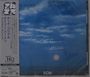 Text: "CRYSTAL SILENCE", "GARY BURTON CHICK COREA", japanische Schriftzeichen. Himmel mit Wolken und untergehender Sonne.