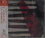 „The Genius of Bud Powell“ ist auf einer gestreiften, abstrakten Gestaltung zu lesen. Japanische Schriftzeichen sind links.