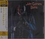"John Coltrane Bahia" in orange Schrift. Links japanische Schriftzeichen. Im Hintergrund ein Musiker mit Saxophon.