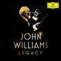 "JOHN WILLIAMS LEGACY" in goldener Schrift, ein Dirigent mit erhobenem Taktstock, oben rechts ein gelbes Logo.