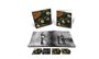 "Rubber Soul" steht in orange Schrift auf zwei Albumcovers, darunter ein offenes Buch mit Bildern und weitere Cover.