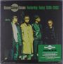 "Ocean Colour Scene Yesterday Today 1999-2003." Vier Männer in Mänteln stehen nebeneinander.