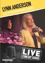 "Lynn Anderson Live at the Renaissance Center", Live-Konzertreihe, Frau mit Mikrofon, Blumenstrauß, Bühne, gelber Hintergrund.