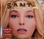 Text: "SANTA", "Édition Or", "3 inédits". Großaufnahme eines blonden Gesichts mit ausdrucksstarken Augen.