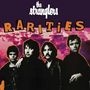 Text: "the Stranglers RARITIES". Vier Männer in dunkler Kleidung vor einem rosa Himmel.
