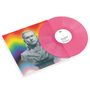 Text: HOLLY JOHNSON, "Love and Liberation", BMG Rights Management. Eine pinke Vinylplatte, Porträtbüste vor Regenbogen.