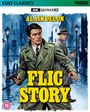 "FLIC STORY", "ALAIN DELON" in großen gelben Buchstaben, Illustration: Zwei Männer mit Waffen in regnerischer Stadt.