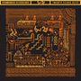 Der Text oben lautet: "BROWNSWOOD RECORDINGS", "TWENTY YEARS DEEP". Das Logo zeigt abstrakte orange Muster und Figuren.
