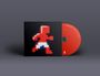 CD mit rotem Label, Text: "MARK GUILIANA, BEAT MUSIC 2.0", daneben ein pixeliger, rot-weißer Läufer auf schwarzem Cover.