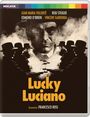 Die Namen "Gian Maria Volontè", "Rod Steiger", "Edmond O'Brien", "Vincent Gardenia", "Lucky Luciano", "Directed by Francesco Rosi". Silhouetten von Männern mit Hüten.