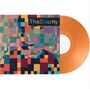 "The Enemy" steht auf einem farbenfroh verpixelten Cover mit einem Gesicht. Es ist eine orangefarbene Vinyl-Schallplatte.