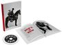 Buch und CD mit "HOW'S IT GOIN'"-Text. Buch zeigt Mann auf Pferd mit Gitarre und sitzende Person.