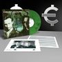 "Cabaret Voltaire: Code" auf einem Albumcover, daneben eine grüne Schallplatte, Texte und ein stilisiertes Logo im Hintergrund.