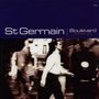 "St Germain | Boulevard, the complete series" in weißem und blauem Text. Verschwommener Mann in Bewegung auf einer Straße.