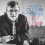 Krzysztof Olczak, Solo and Chamber Music for Accordion, Mea. Ein Mann mit Brille und Anzug lehnt nachdenklich.