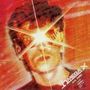 Text: "MEGA X" und "DC Comis", Illustration: Eine Person mit strahlenden Augen, Hintergrund in Rot und Orange gehalten.