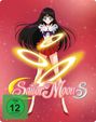 „FSK ab 12 freigegeben“, „Sailor Moon S“. Eine Anime-Figur in rotem Outfit mit goldenen Ringen vor rotem Hintergrund.