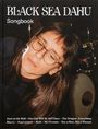 Text oben: "BLACK SEA DAHU Songbook." Unten: Songtitel wie "Ants on the Wall, One Day, The Dragon." Frau mit Brille in Nahaufnahme.