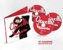 "57 CANZONI NEW EDITION 2026". Drei rote CDs und eine Hülle mit einer fröhlichen Frau und dem Namen der Künstlerin.