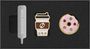 Links steht "MOLESKINE". Rechts ein Becher und ein Donut-Design mit Strasssteinen.