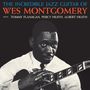 Text: "THE INCREDIBLE JAZZ GUITAR OF WES MONTGOMERY WITH TOMMY FLANAGAN, PERCY HEATH, ALBERT HEATH". Schwarz-Weiß-Foto eines Mannes mit Gitarre.