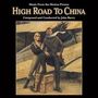 "Music From the Motion Picture High Road to China. Composed and Conducted by John Barry." Illustration eines Paares vor einem Flugzeug.