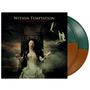 „Within Temptation: The Heart of Everything“. Frau auf Thron mit Vögeln umgeben, trägt Bandagen und hält Kette.