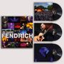 "45 Jahre Fendrich Live 2025" zeigt Konzertfotos und Schallplatten mit Bühnenbildern und Gitarrenspieler.