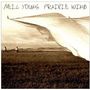 Text: "Neil Young Prairie Wind." Sepia-Tonaufnahme mit einem großen, wehenden Tuch über einer offenen Prärie.