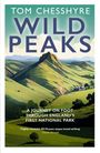 Der Text oben lautet: "Tom Chesshyre WILD PEAKS". Darunter malerische Hügel und ein ländliches Haus.