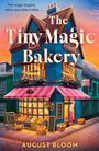 Text: „The Tiny Magic Bakery“, „August Bloom“, „Cover to be revealed“. Hintergrund in warmen Farbtönen, pastellartiger Verlauf.