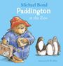 Text: "Michael Bond, Paddington at the Zoo, Illustrated by R. W. Alley".  
Illustration: Paddington-Bär mit Koffer und Pinguinen.