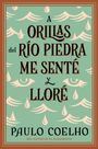 Paulo Coelho: By the River Piedra I Sat Down and Wept: A Orillas del Río Piedra Me Senté Y Lloré / (Spanish Edition), Buch
